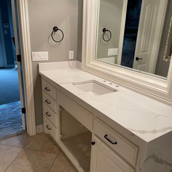 Stonemen Granite & Marble - Bathroom countertop with waterfall edge - Countertop Installation Near Me - Tulsa, Oklahoma