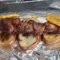 Flama Tropical - Pincho de cerdo y de pollo