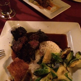 Hearthstone Restaurant - Butchers steak, grits, Brussel sprouts, and fried egg in fried batter. - New American Near Me - Breckenridge, Colorado