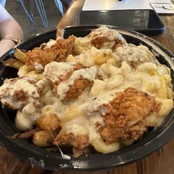 A Little Taste of Culture - Chicken tender bowl (Mac n cheese, chicken tender pieces, fries). Comes with two sauces of your choice.  This one had ranch.