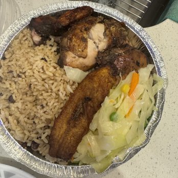 The Door - Jerk chicken with peas and rice - Caribbean Near Me - Jamaica, New York The Door - Jerk chicken with peas and rice - Caribbean Near Me - Jamaica, New York