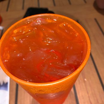 Hooters - a plastic cup filled with liquid - Sports Bars Near Me - Clearwater, Florida