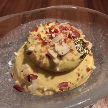 Indian Accent - makhan malai, saffron milk, rose petal jaggery brittle, almonds - Indian Near Me - New York, New York Indian Accent - makhan malai, saffron milk, rose petal jaggery brittle, almonds - Indian Near Me - New York, New York