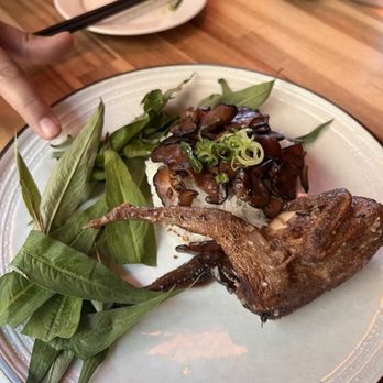 Annam VL - Quail on plate with sticky rice and a healthy serving of Rau ram, aka- Vietnamese coriander (Persicaria odorata). - Vietnamese Near Me - Portland, Oregon