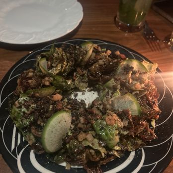 Butter Midtown - Raw and roasted Brussels sprouts salad with green radishes and apples. - New American Near Me - New York, New York Butter Midtown - Raw and roasted Brussels sprouts salad with green radishes and apples. - New American Near Me - New York, New York
