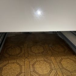 Garcia’s Cleaning - Bottom of the stove.