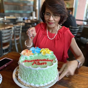 Van's Bakery - Mom cutting into her cake. - Bakeries Near Me - San Jose, California
