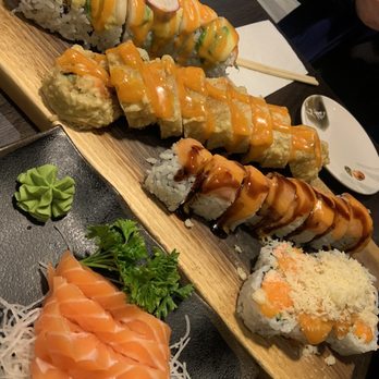 Zuki Japanese Restaurant - Order from left to right: - Ocean spicy roll - Kamikaze roll - Smoked salmon roll - Spicy crab roll - 4 Sake sashimi - Japanese Near Me - Toronto, Ontario Zuki Japanese Restaurant - Order from left to right: - Ocean spicy roll - Kamikaze roll - Smoked salmon roll - Spicy crab roll - 4 Sake sashimi - Japanese Near Me - Toronto, Ontario