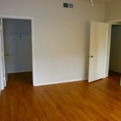 The Lodge at Lost Pines Apartments - Aspen bedroom and closet.