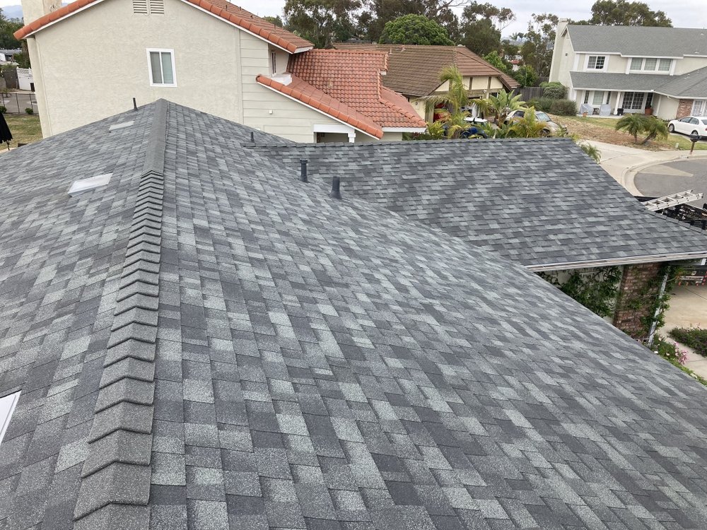 Slide of Mo's Professional Roofing