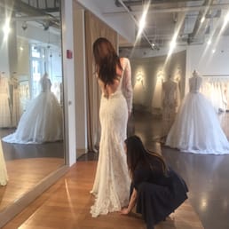 Ignore my ugly bra. The consultant made sure to show me every detail of the dress... She was so amazing and helpful!
