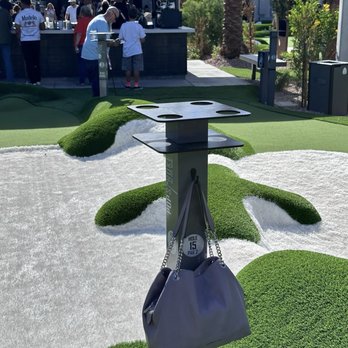 PopStroke - Drink holders with purse hook at every hole - Mini Golf Near Me - Paradise, Nevada PopStroke - Drink holders with purse hook at every hole - Mini Golf Near Me - Paradise, Nevada