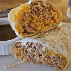 Suzy's Cafe - Custom breakfast burrito with chorizo, eggs, rice, and mixed cheese. Decent. A bit mushy. Maybe add in some crispy hashbrowns.