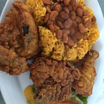 Niagara Cafe - Specialty fried chicken with yellow rice & beans and a side salad. Power packed with flavor that will blow your socks off!!! - Puerto Rican Near Me - Buffalo, New York Niagara Cafe - Specialty fried chicken with yellow rice & beans and a side salad. Power packed with flavor that will blow your socks off!!! - Puerto Rican Near Me - Buffalo, New York