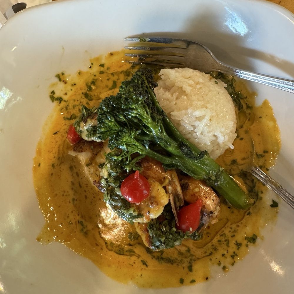 Snapper and Shrimp in a coconut curry sauce with Brocolinni and Jasmine Rice. Snapper and Shrimp in a coconut curry sauce with Brocolinni and Jasmine Rice.
