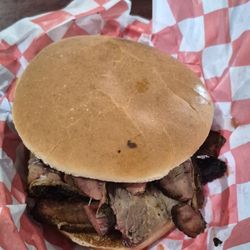 Straight Off The Road BBQ - Sliced brisket sandwich