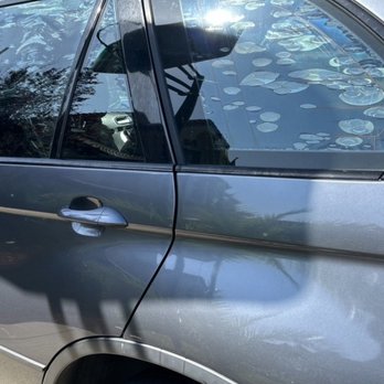 Lion's Autoshade - Before - the ruined tint on drivers side - Car Window Tinting Near Me - Rancho Cordova, California