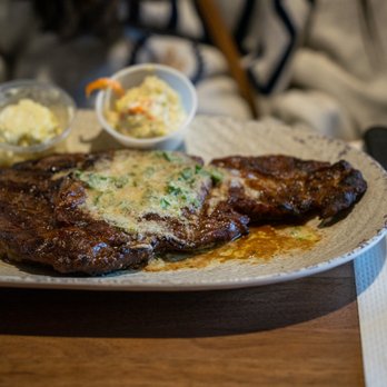 The Assembly - Grilled Steak with Garlic Butter - American Near Me - West Dundee, Illinois The Assembly - Grilled Steak with Garlic Butter - American Near Me - West Dundee, Illinois