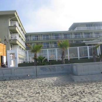 Surfer Beach Hotel - Beach side of the Surfer Beach hotel. The great patio with guest access is a great way to sit and enjoy the evening view. - San Diego, CA
