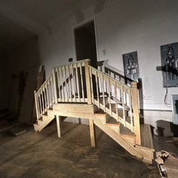 JCM Builder - We suggested the client to go with a double stair case in the garage he really liked it .