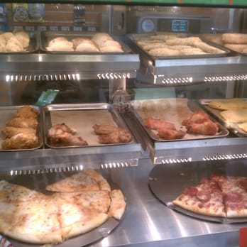 7-Eleven - a variety of pizzas in a display case - Convenience Stores Near Me - Boston, Massachusetts
