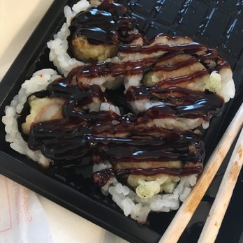 Musubi - Shrimp tempura roll covered in a sugary sauce with a tiny piece of shrimp inside. Nasty... - Japanese Near Me - Milan, Michigan