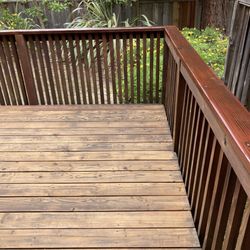 Dominic Sandoval - Freshening up deck with sanding and staining