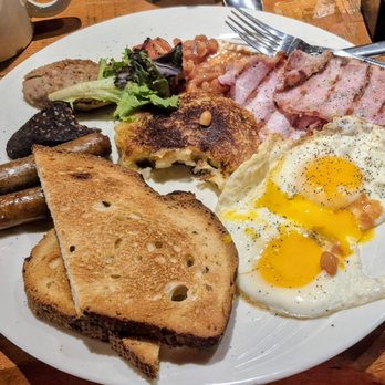 Five Furlongs - 10-11-26. Irish breakfast. 2 sausage, 2 eggs, 2 slices of back bacon, black pudding, beans, potato pancake and sourdough toast. Awesome! - Bars Near Me - East Durham, New York
