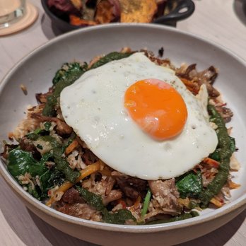 THE WELL Kitchen & Table - Cauliflower Fried Rice was really good , add a fried egg ! - Breakfast & Brunch Near Me - New York, New York THE WELL Kitchen & Table - Cauliflower Fried Rice was really good , add a fried egg ! - Breakfast & Brunch Near Me - New York, New York