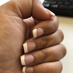 Acrylic set with regular French manicure. Acrylic set with regular French manicure.