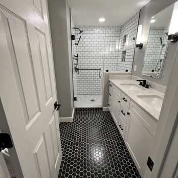 FSA Construction & Electrical - a black and white bathroom - General Contractors Near Me - Clinton, Massachusetts