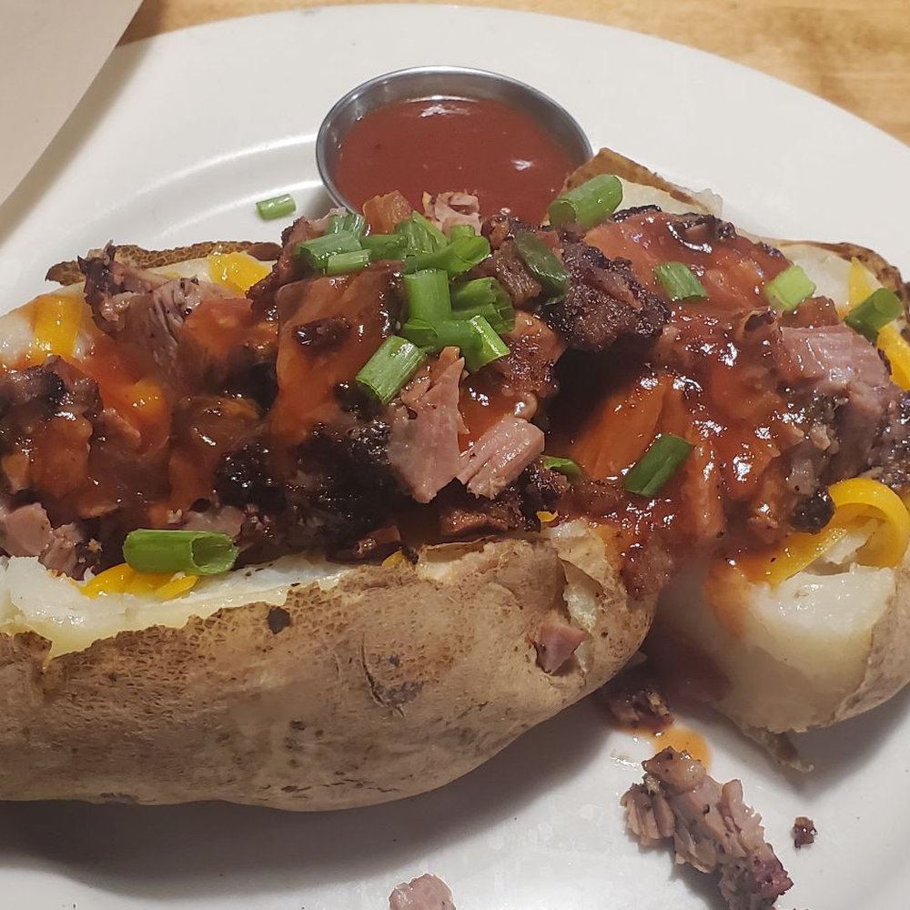 Jim 'N Nick's Bar-B-Q - Loaded baked potato. - Barbeque Near Me - Birmingham, Alabama Jim 'N Nick's Bar-B-Q - Loaded baked potato. - Barbeque Near Me - Birmingham, Alabama