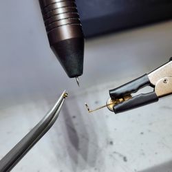Get Your Fix Optics - Precision is the key! Thin titanium post, challenge accepted.