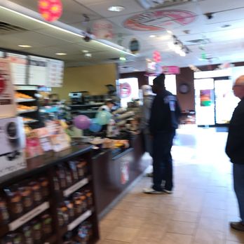 Dunkin' - people shopping in a grocery store - Donuts Near Me - White Plains, New York Dunkin' - people shopping in a grocery store - Donuts Near Me - White Plains, New York