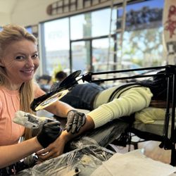 Hermosa Ink Collective - Yustyna making a clients tattoo dreams come true.