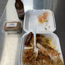 Dutch Pot - Brown stew fish, steam veg, rice & peas topped off with ginger beer to wash it dung! Got a Toto on the side with order from the manager.