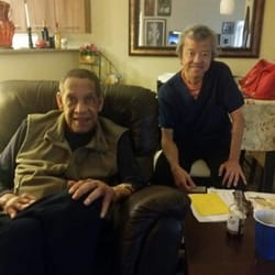 ProHealth Home Care - Ex NBA Sonic's basketball player John Johnson with one of our caregivers.