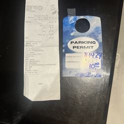 Hana Travel Plaza - This is the parking receipt and the parking permit.