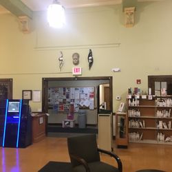 Oak Park Public Library Dole Branch - Main floor facing west, where you walk in from front. Notice African masks above the door!