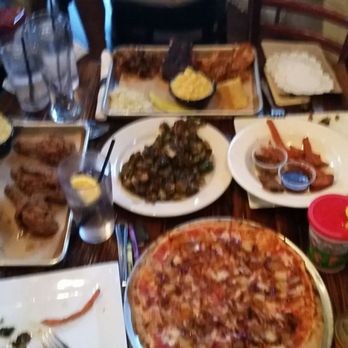 Sterling Pig Brewery - too crowded, even AFTER we removed the 4-pack of sauces! Serve pizza on an elevated tray/move the bbq off weirdly medical-looking thing? - Breweries Near Me - Media, Pennsylvania