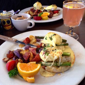 Sweet Maple - Crab Benedict (front) Bacon Benedict (back) and raspberry lemonade mimosa - American Near Me - San Francisco, California Sweet Maple - Crab Benedict (front) Bacon Benedict (back) and raspberry lemonade mimosa - American Near Me - San Francisco, California