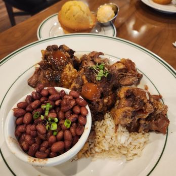 Fixins - Oxtail, red beans & rice with a cornbread muffin - Soul Food Near Me - Detroit, Michigan Fixins - Oxtail, red beans & rice with a cornbread muffin - Soul Food Near Me - Detroit, Michigan