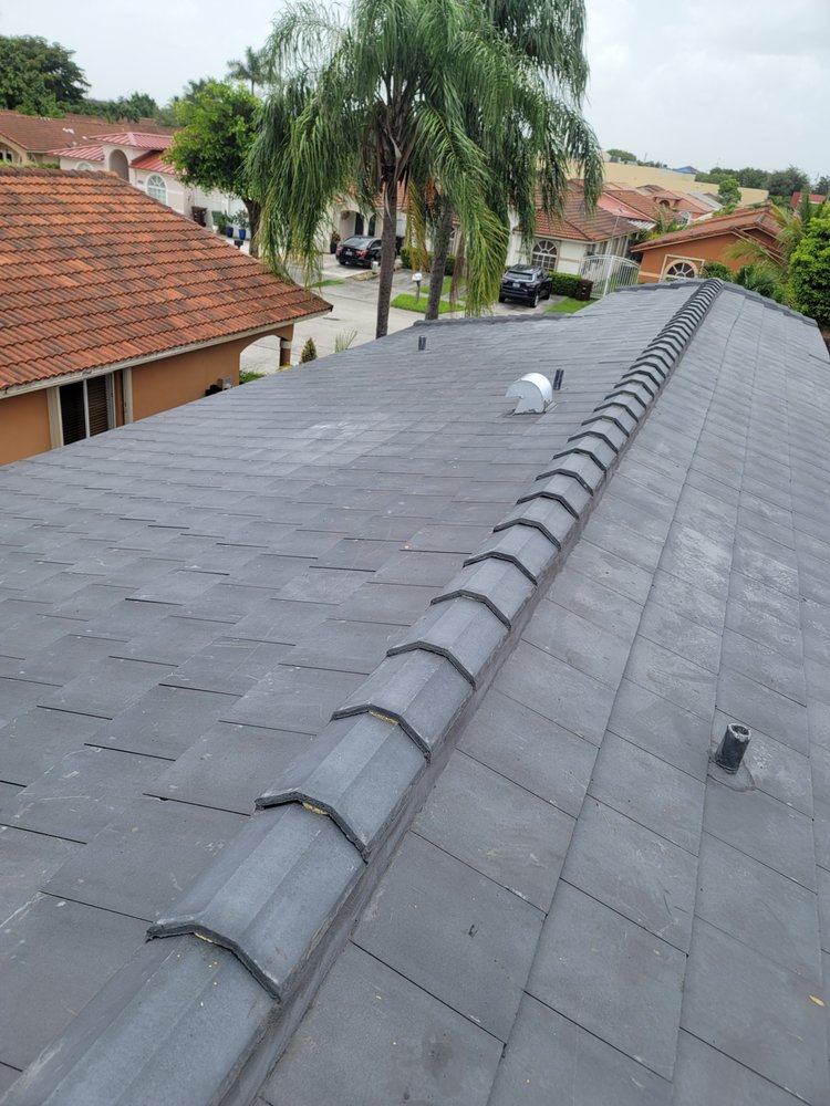 Slide of JMR Roofing Services