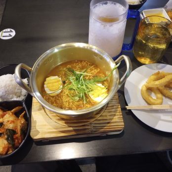 CM Chicken & Boba - Korean-style spicy scallion ramen, with kimchi & rice (also shown: fried calamari, lemon green onion chicken tenders, Sapporo draft) - Burgers Near Me - Vernon Hills, Illinois CM Chicken & Boba - Korean-style spicy scallion ramen, with kimchi & rice (also shown: fried calamari, lemon green onion chicken tenders, Sapporo draft) - Burgers Near Me - Vernon Hills, Illinois