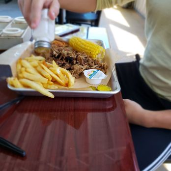 Boondocks BBQ & Creamery - a woman sitting at a table - Barbeque Near Me - Wedowee, Alabama
