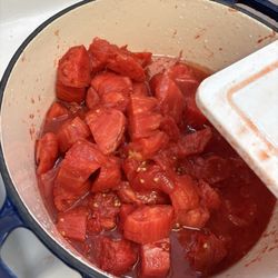 Justy's Produce and Flowers - Showing how meaty the tomatoes are and without a ton of seeds!!!