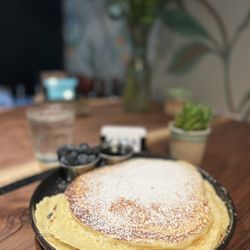 Casa East Sac - Plate size pancakes with a side of blueberries.