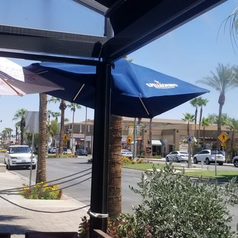 Il Corso - Outdoor dining area with shade a water spray - Italian Near Me - Palm Desert, California Il Corso - Outdoor dining area with shade a water spray - Italian Near Me - Palm Desert, California