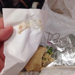 Tropical Grill - A bone or something?! How did something this big end up in there??? I'm so disgusted