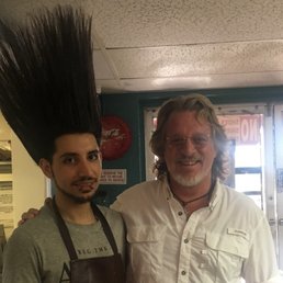 a man with a very long hair